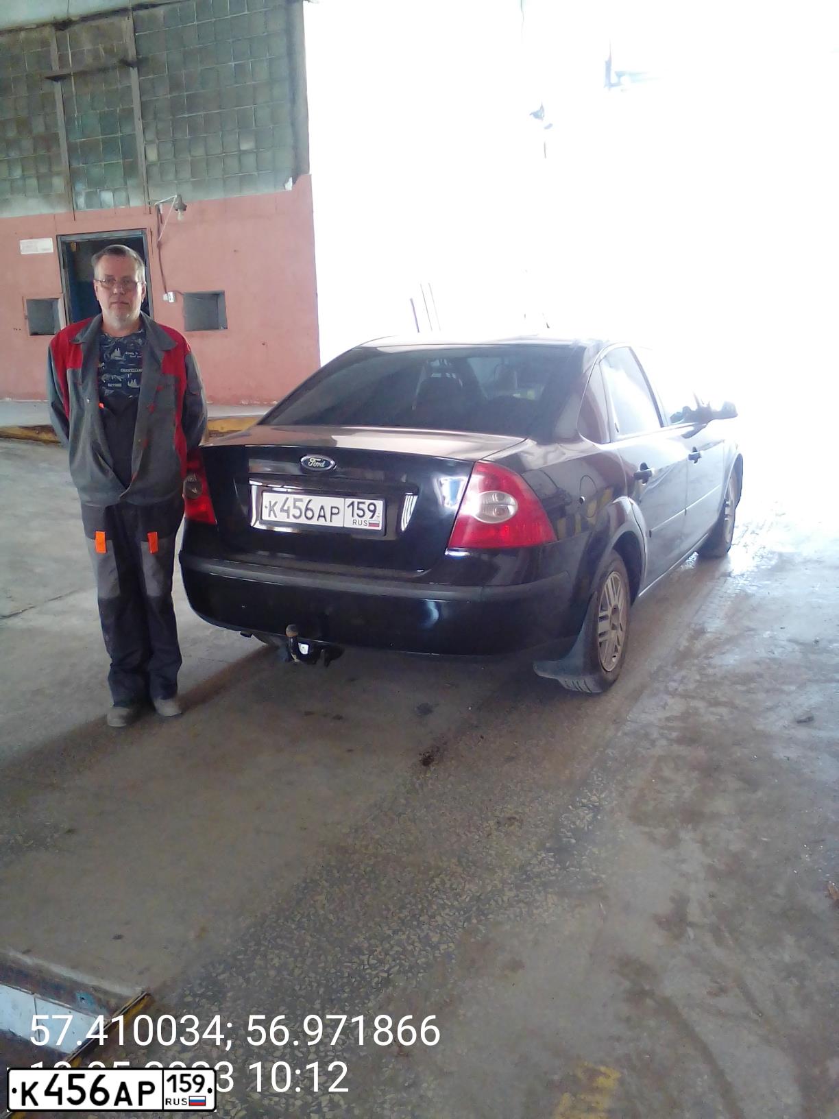 Фото автомобиля FORD D FOCUS, 2006 — госномер М817ОО702. Цвет: ЧЕРНЫЙ