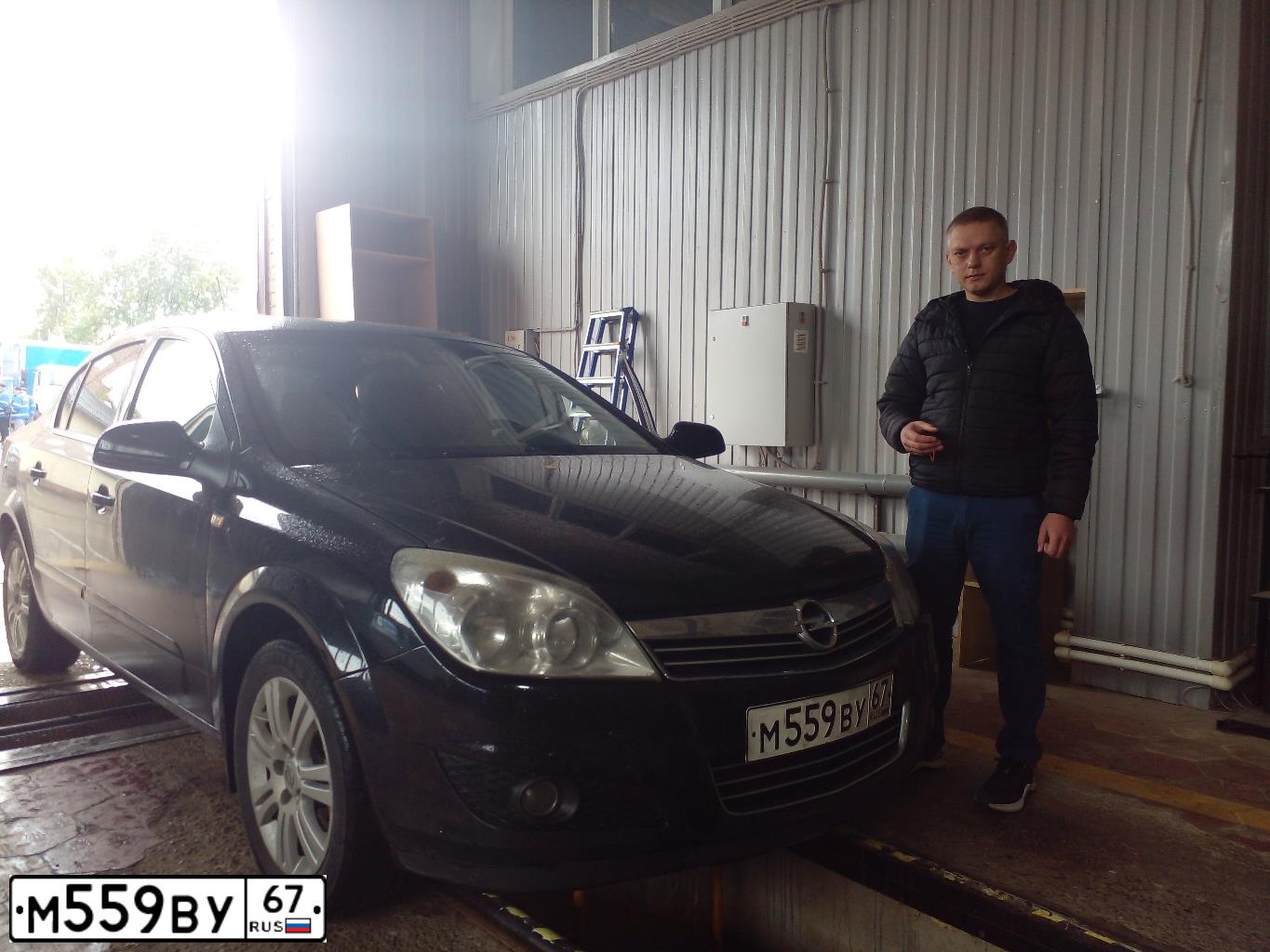 Фото автомобиля OPEL ASTRA, 2011 — госномер Е191СВ57. Цвет: ЧЕРНЫЙ