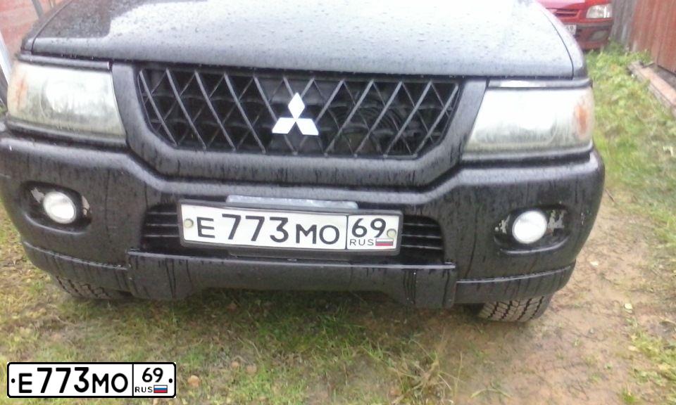 Фото автомобиля MITSUBISHI MONTERO, 2002 — госномер Е773МО69. Цвет: ЧЕРНЫЙ