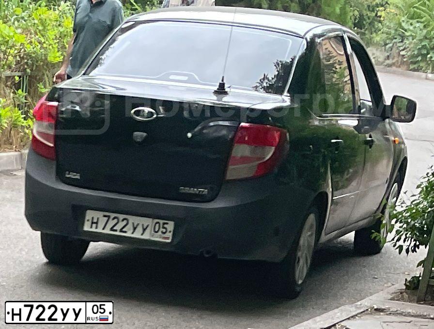 Фото автомобиля LADA 2190 GRANTA, 2012 — госномер Н722УУ05. Цвет: Сине-Черный