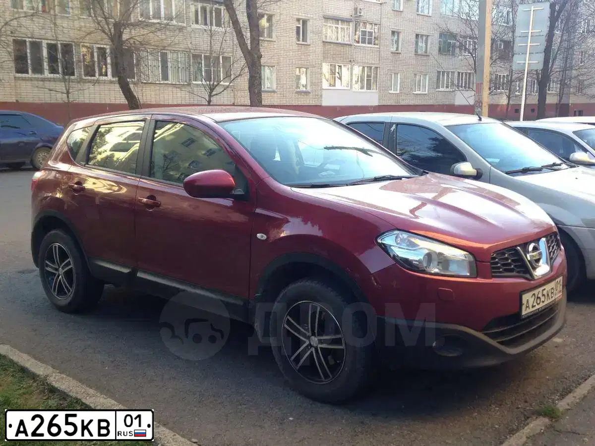 Фото автомобиля NISSAN QASHQAI, 2010 — госномер О704ТС161. Цвет: Красный
