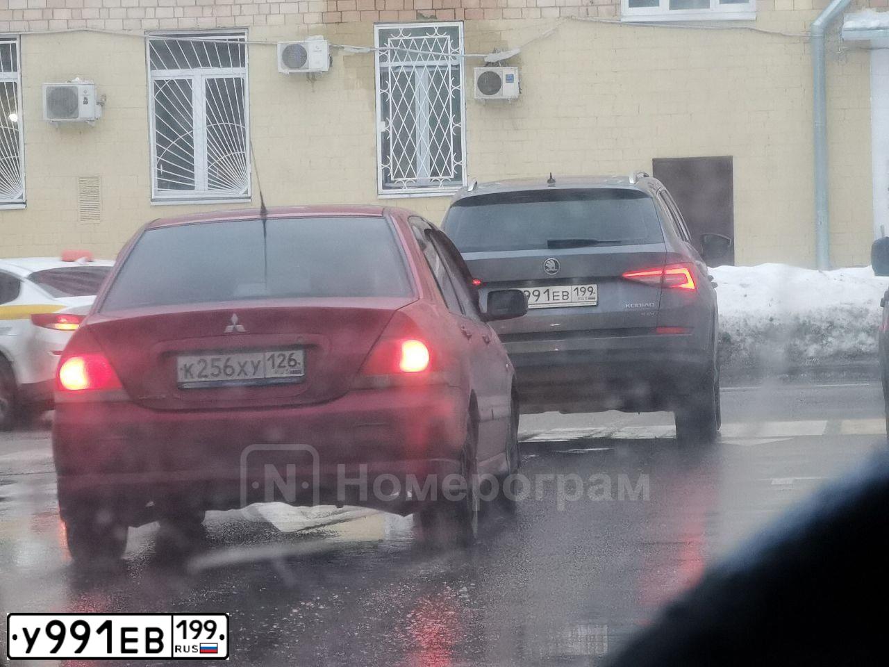Фото автомобиля BMW X5, 2005 — госномер У991ЕВ199. Цвет: ЧЕРНЫЙ