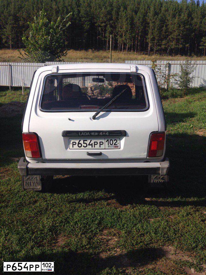 Фото автомобиля LADA 2121 NIVA, 2009 — госномер Р654РР102. Цвет: ЯРКО-БЕЛЫЙ