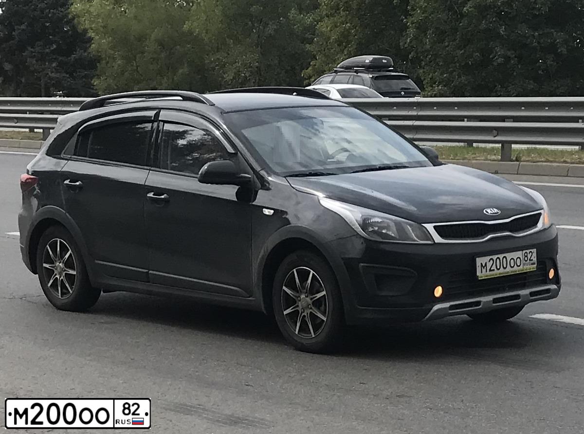 Фото автомобиля KIA RIO, 2020 — госномер М200ОО82. Цвет: ЧЕРНЫЙ