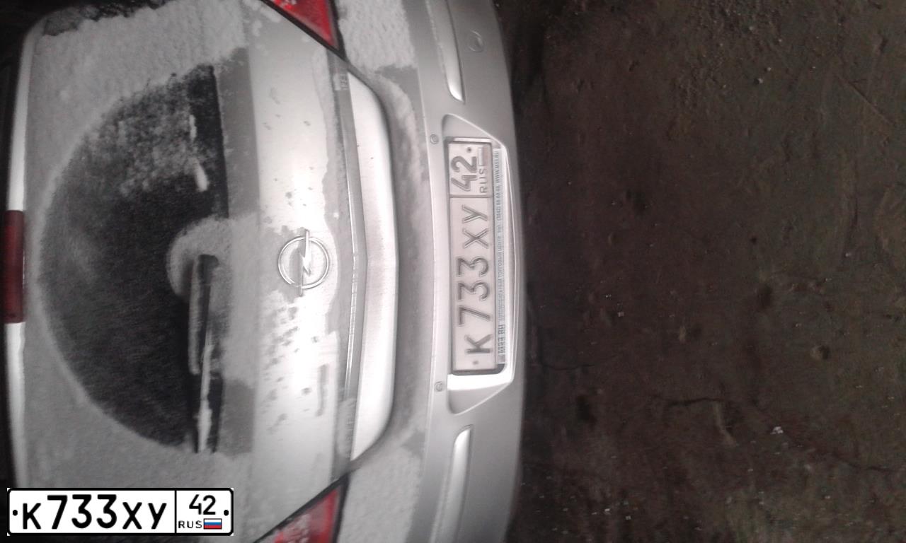 Фото автомобиля OPEL ASTRA, 2006 — госномер А052НК142. Цвет: СЕРЕБРИСТЫЙ