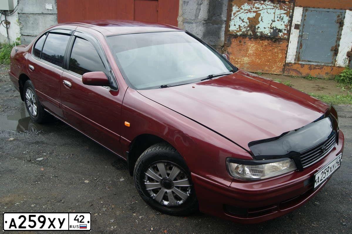 Фото автомобиля NISSAN MAXIMA, 1996 — госномер С239НС42. Цвет: КРАСНЫЙ
