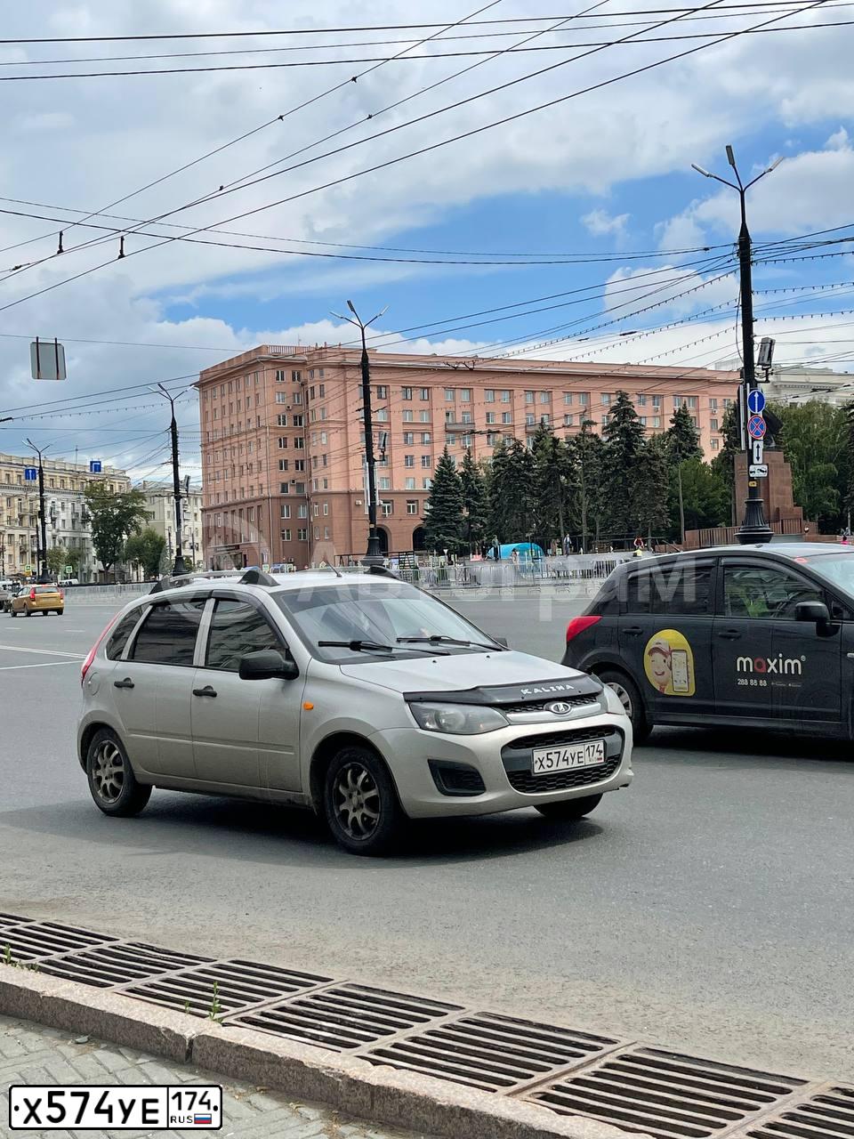 Фото автомобиля LADA 2192 KALINA, 2014 — госномер Х574УЕ174. Цвет: Серебристый