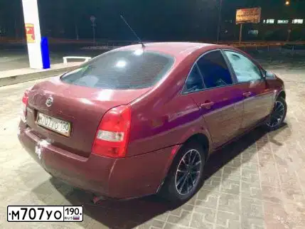Фото автомобиля NISSAN PRIMERA, 2003 — госномер О811ВО48. Цвет: КРАСНЫЙ ТЕМНЫЙ