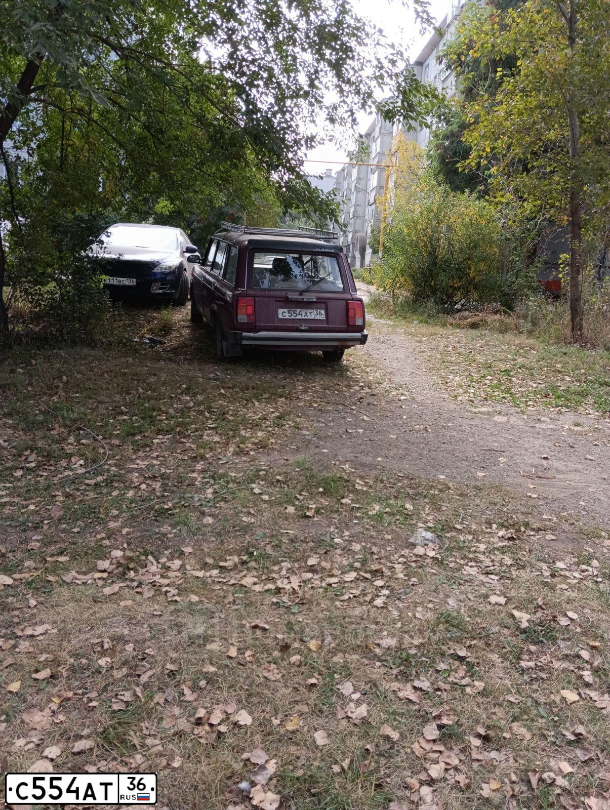 Фото автомобиля LADA 2104 LADA, 2000 — госномер С554АТ36. Цвет: БОРДОВЫЙ