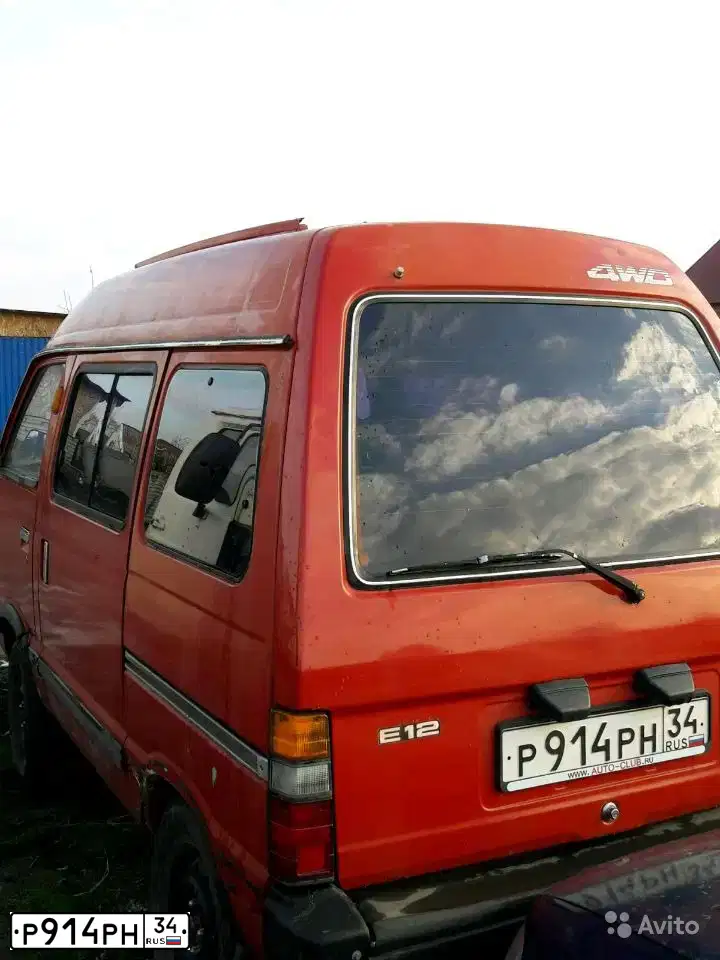 Фото автомобиля SUBARU LIBERO / E 12, 1991 — госномер Р914РН34. Цвет: Красный