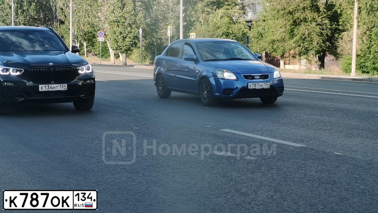 Фото автомобиля KIA RIO, 2011 — госномер Н092ЕХ134. Цвет: синий