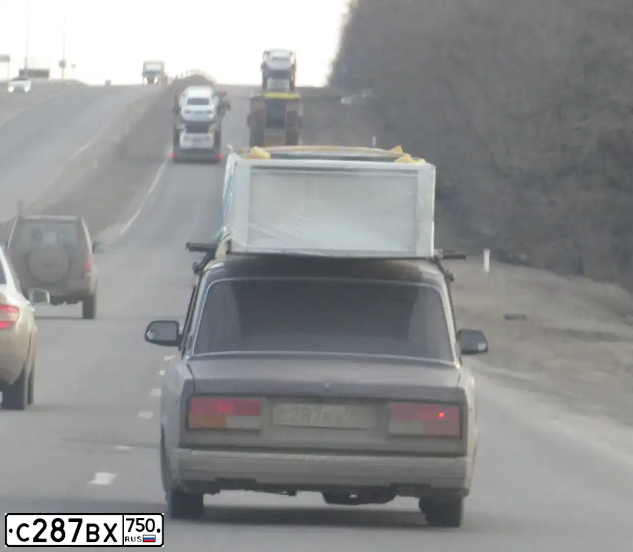 Фото автомобиля LADA 2107, 2002 — госномер К851АВ190. Цвет: ФИОЛЕТОВЫЙ