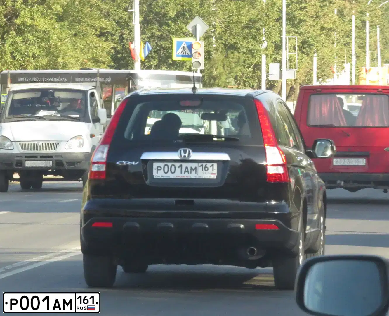 Фото автомобиля HONDA CR-V, 2007 — госномер Р001АМ161. Цвет: ЧЕРНЫЙ