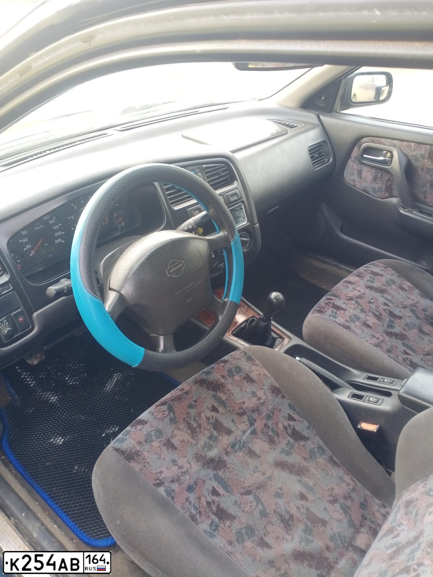 Фото автомобиля NISSAN PRIMERA, 1999 — госномер Х777ТТ50. Цвет: Темно-синий