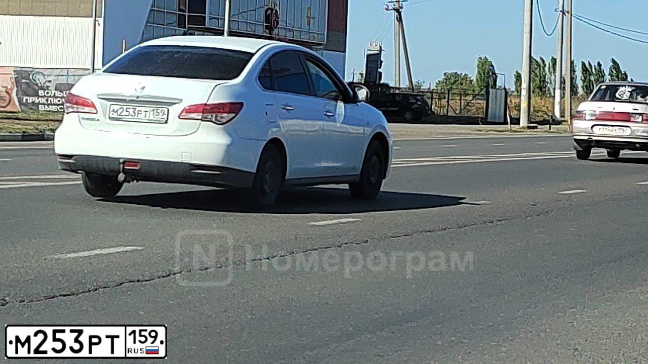 Фото автомобиля NISSAN ALMERA /AVTOVAZ/, 2018 — госномер М129УТ193. Цвет: Белый