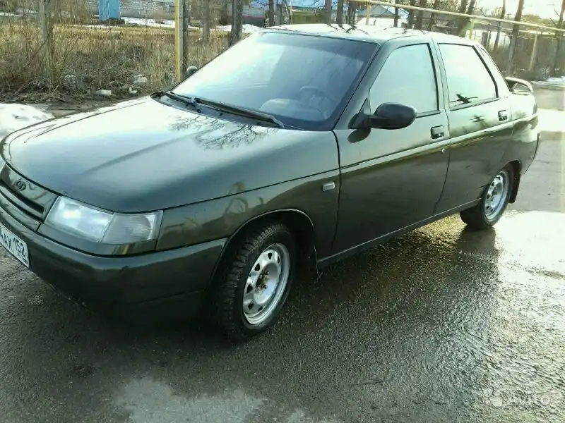 Фото автомобиля LADA 2110 LADA, 2004 — госномер Е224АХ152. Цвет: Темно-зеленый