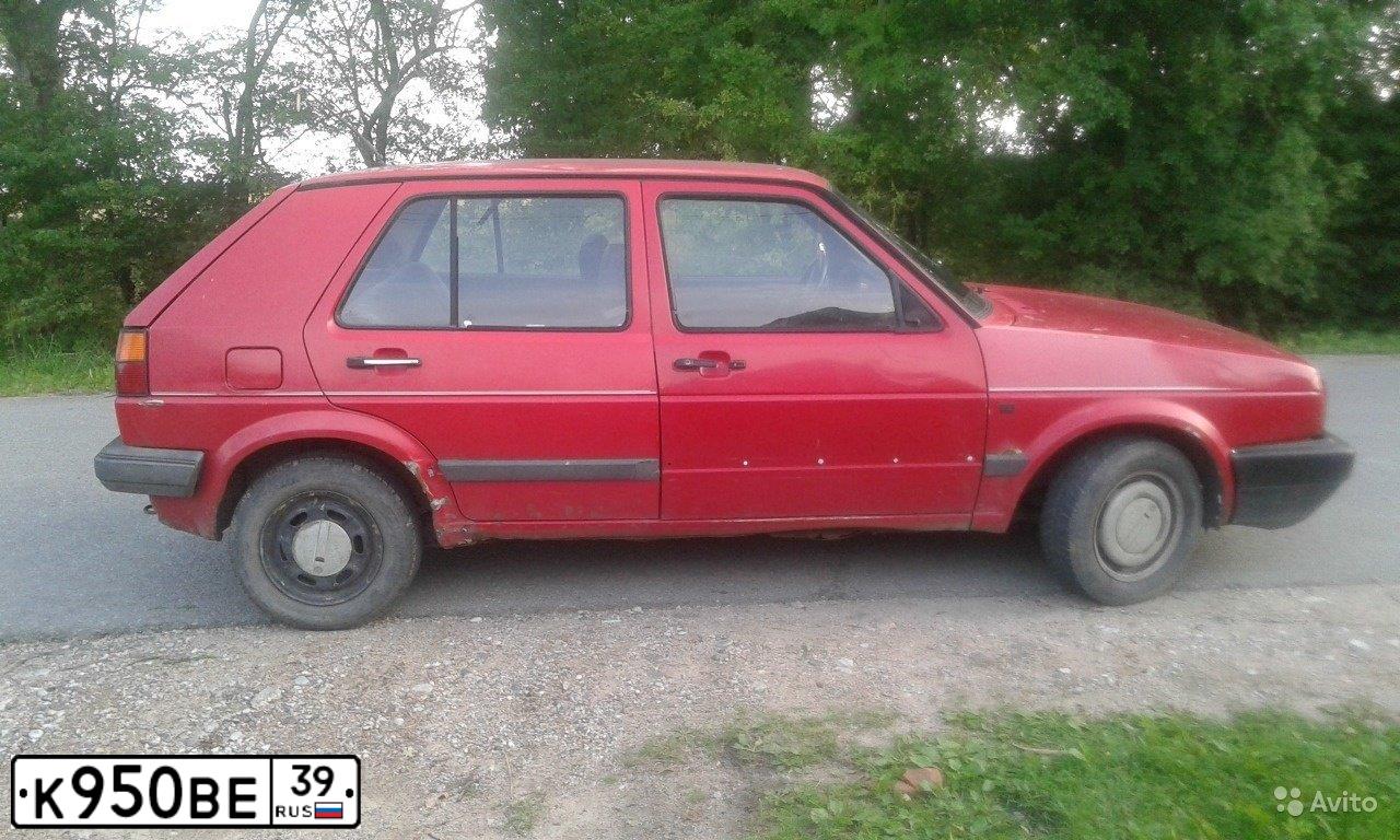 Фото автомобиля VOLKSWAGEN GOLF, 1990 — госномер К950ВЕ39. Цвет: Красный