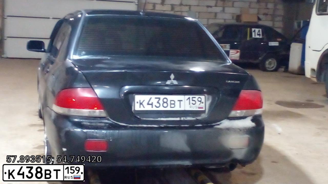 Фото автомобиля MITSUBISHI LANCER, 2004 — госномер М466ОК702