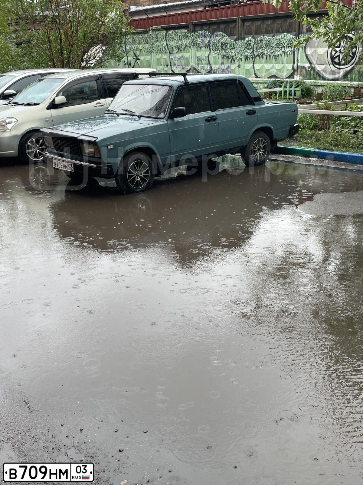 Фото автомобиля LADA 2107, 2003 — госномер В709НМ03. Цвет: Серо-Синий