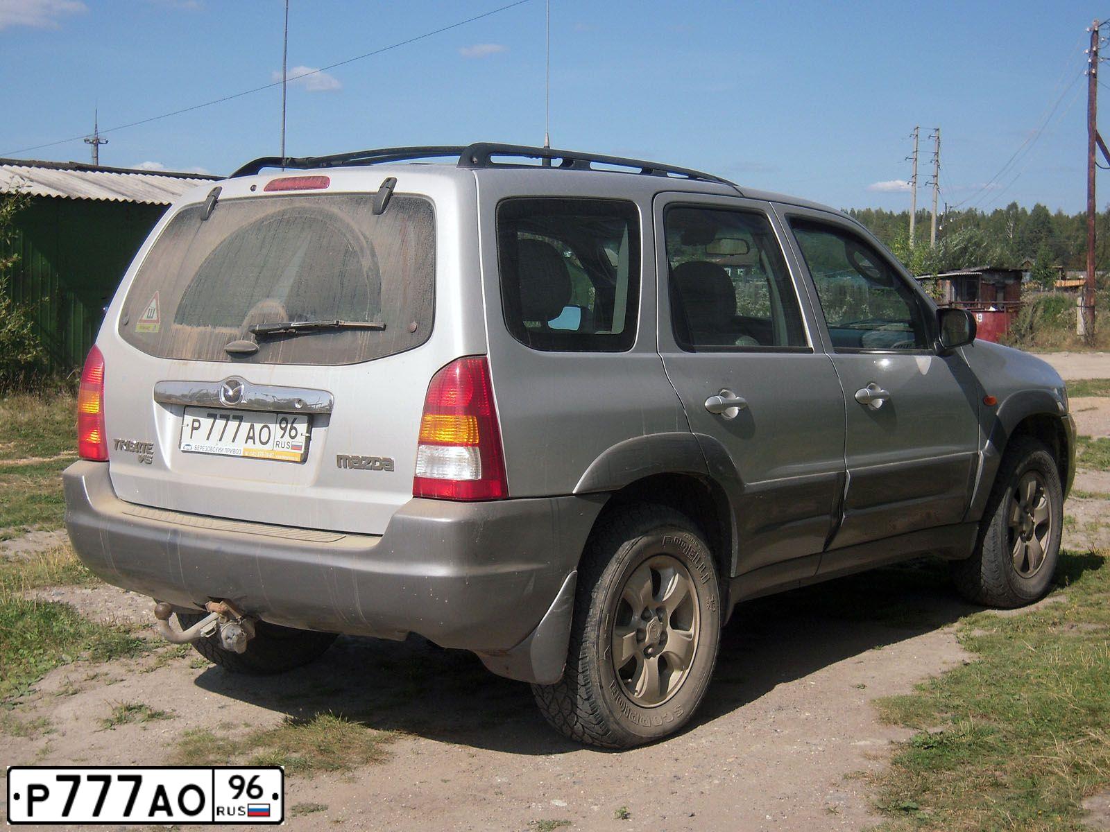 Фото автомобиля MAZDA TRIBUTE, 2001 — госномер Х657НР72. Цвет: Серебристый