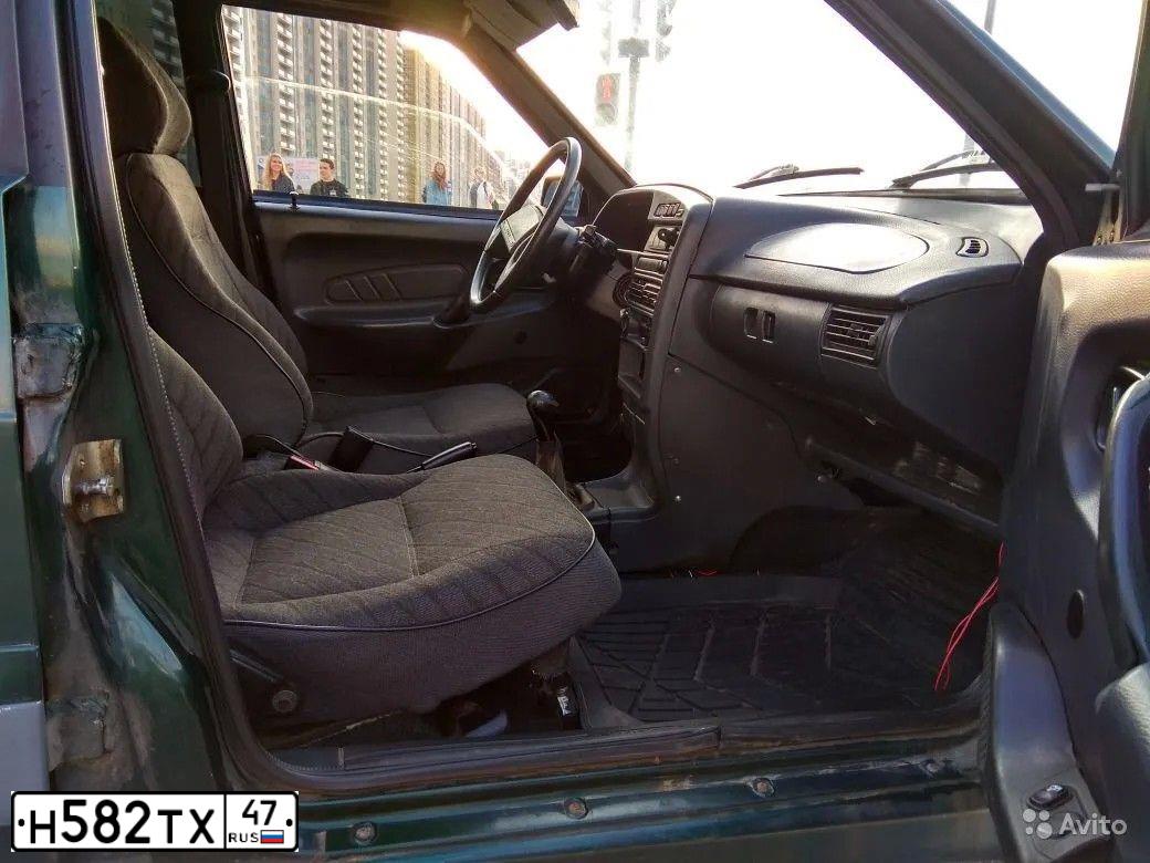 Фото автомобиля LADA 2115, 2003 — госномер Т040СУ198. Цвет: Темно-зеленый