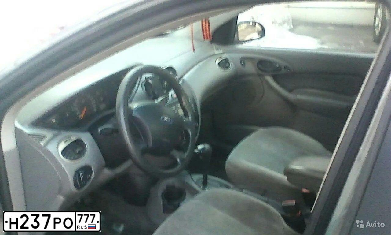 Фото автомобиля FORD FOCUS, 2002 — госномер Х646ЕТ31. Цвет: Серый