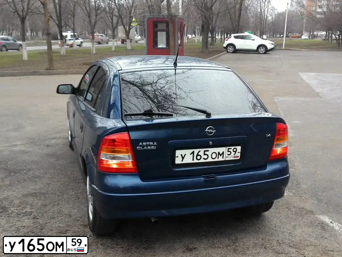 Фото автомобиля OPEL ASTRA, 2004 — госномер С902ЕС761. Цвет: синий