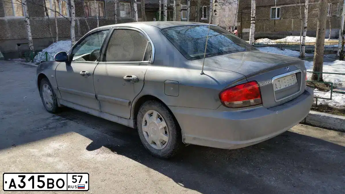 Фото автомобиля TAGAZ Z SONATA, 2007 — госномер О122ММ45. Цвет: СЕРЫЙ