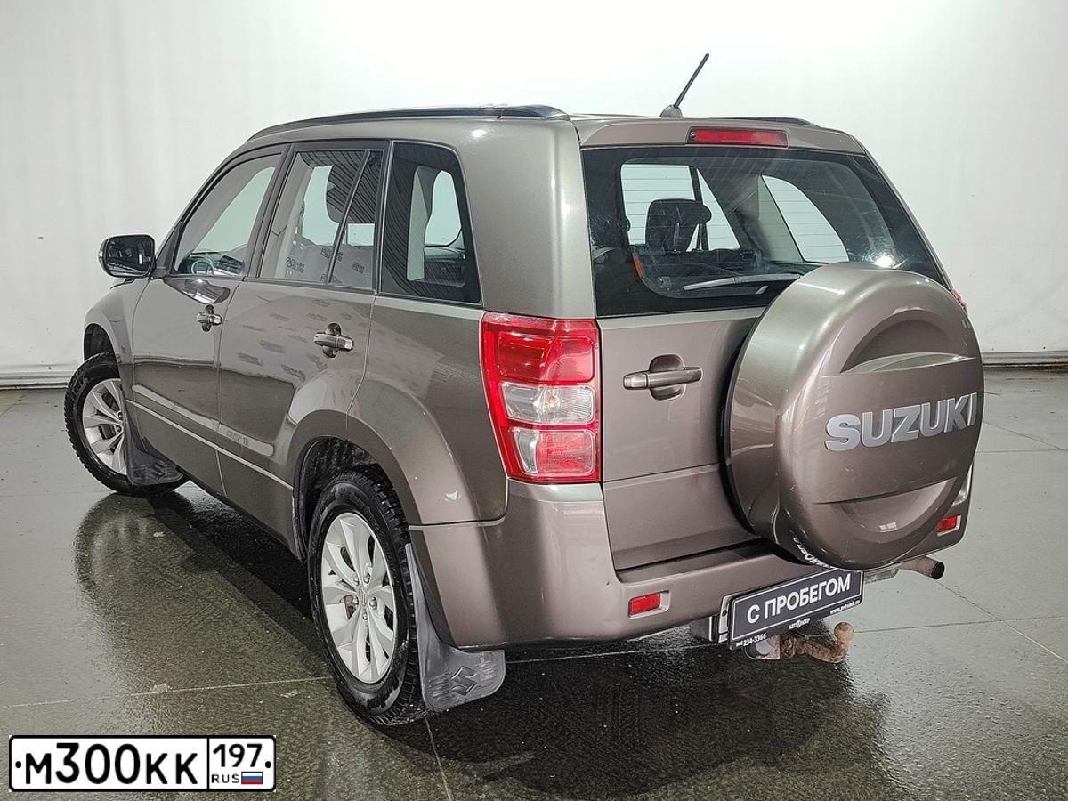 Фото автомобиля SUZUKI /GRAND/ VITARA, 2013 — госномер М300КК197. Цвет: Коричневый