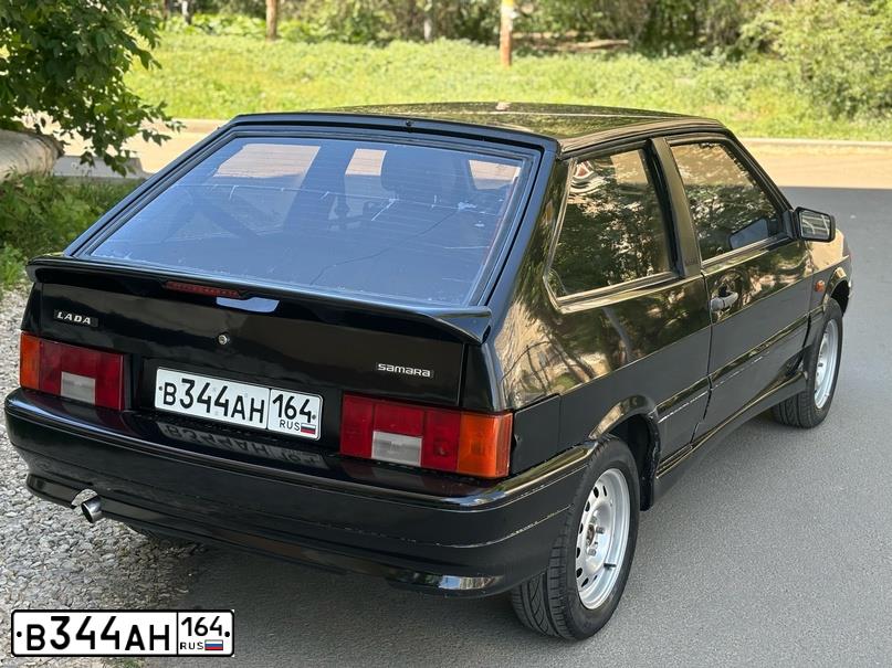Фото автомобиля LADA 2113 SAMARA, 2011 — госномер В344АН164. Цвет: СИНЕ-ЧЕРНЫЙ