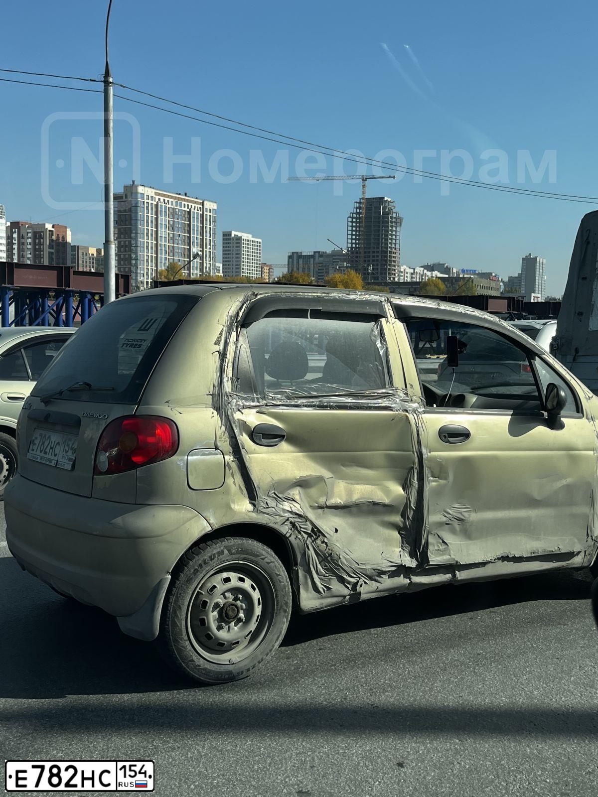 Фото автомобиля DAEWOO MATIZ, 2007 — госномер Е782НС154. Цвет: ПЕСОЧНЫЙ