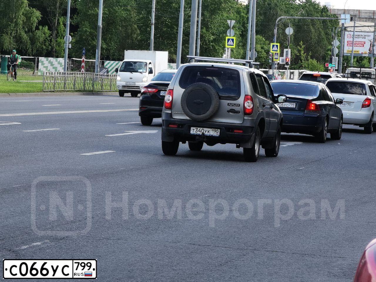 Фото автомобиля VOLKSWAGEN TIGUAN, 2015 — госномер С066УС799. Цвет: ЧЕРНЫЙ