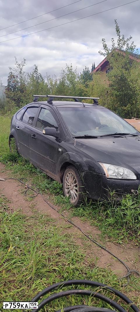 Фото автомобиля FORD FOCUS, 2006 — госномер Р759КА159. Цвет: ЧЕРНЫЙ