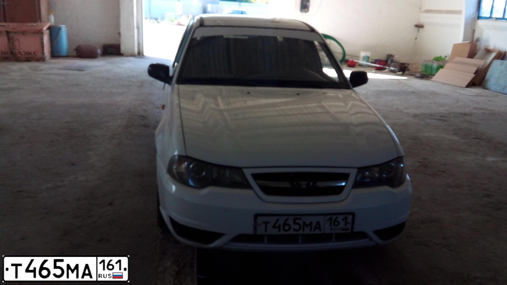 Фото автомобиля DAEWOO O NEXIA, 2010 — госномер Т465МА161. Цвет: Белый