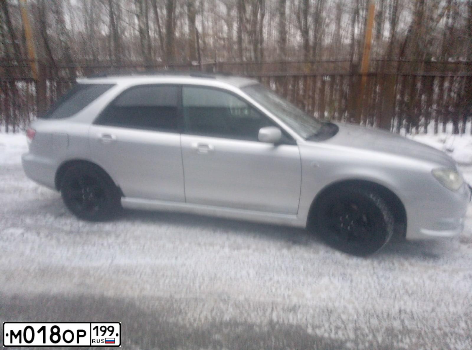 Фото автомобиля SUBARU IMPREZA, 2006 — госномер В466ТК702. Цвет: Серебристый
