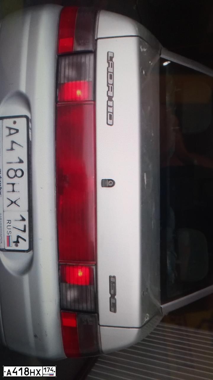 Фото автомобиля LADA 2110, 2004 — госномер А418НХ174. Цвет: СЕРЕБРИСТЫЙ