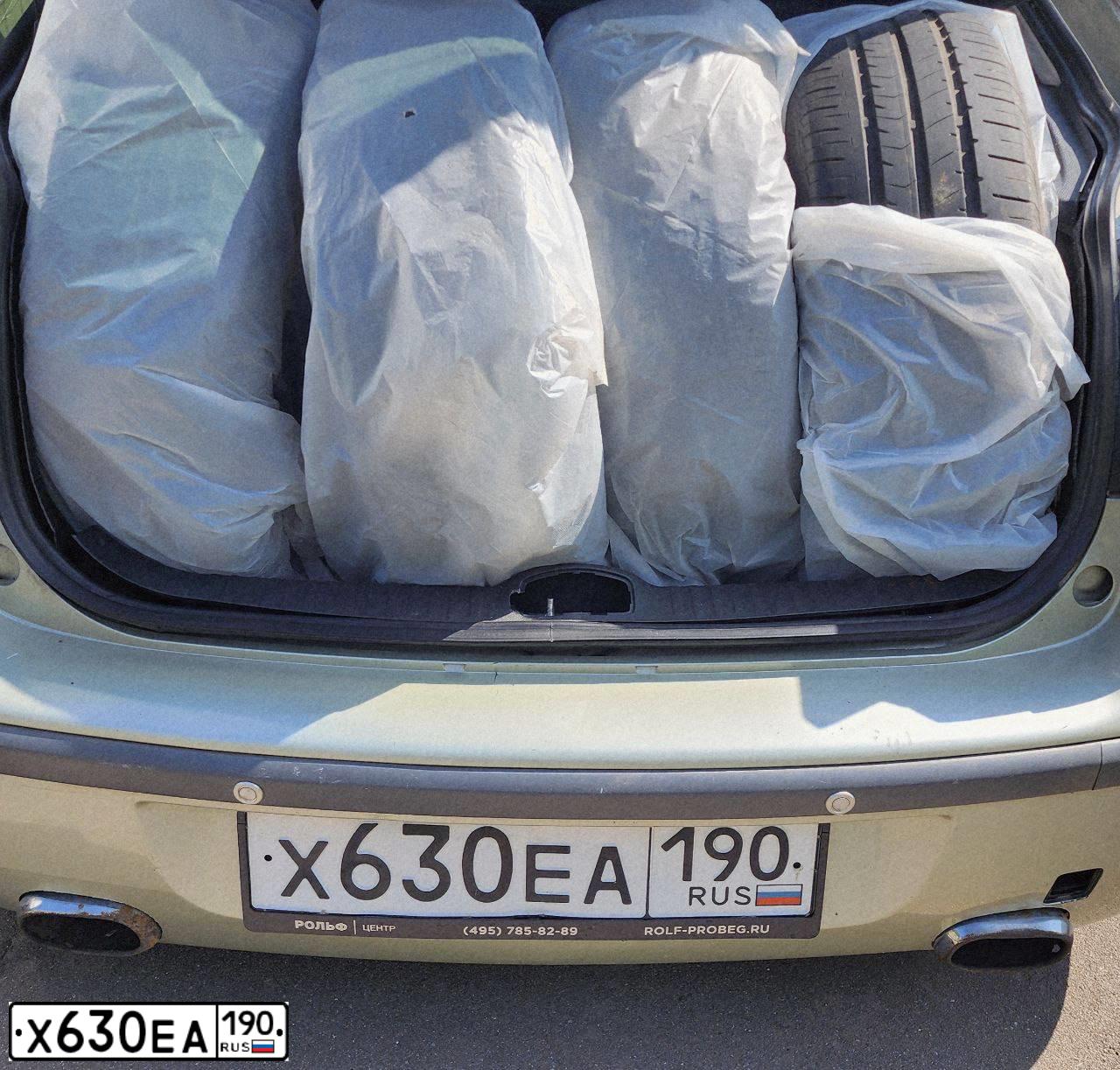 Фото автомобиля RENAULT LAGUNA, 2006 — госномер Х630ЕА190. Цвет: Серый