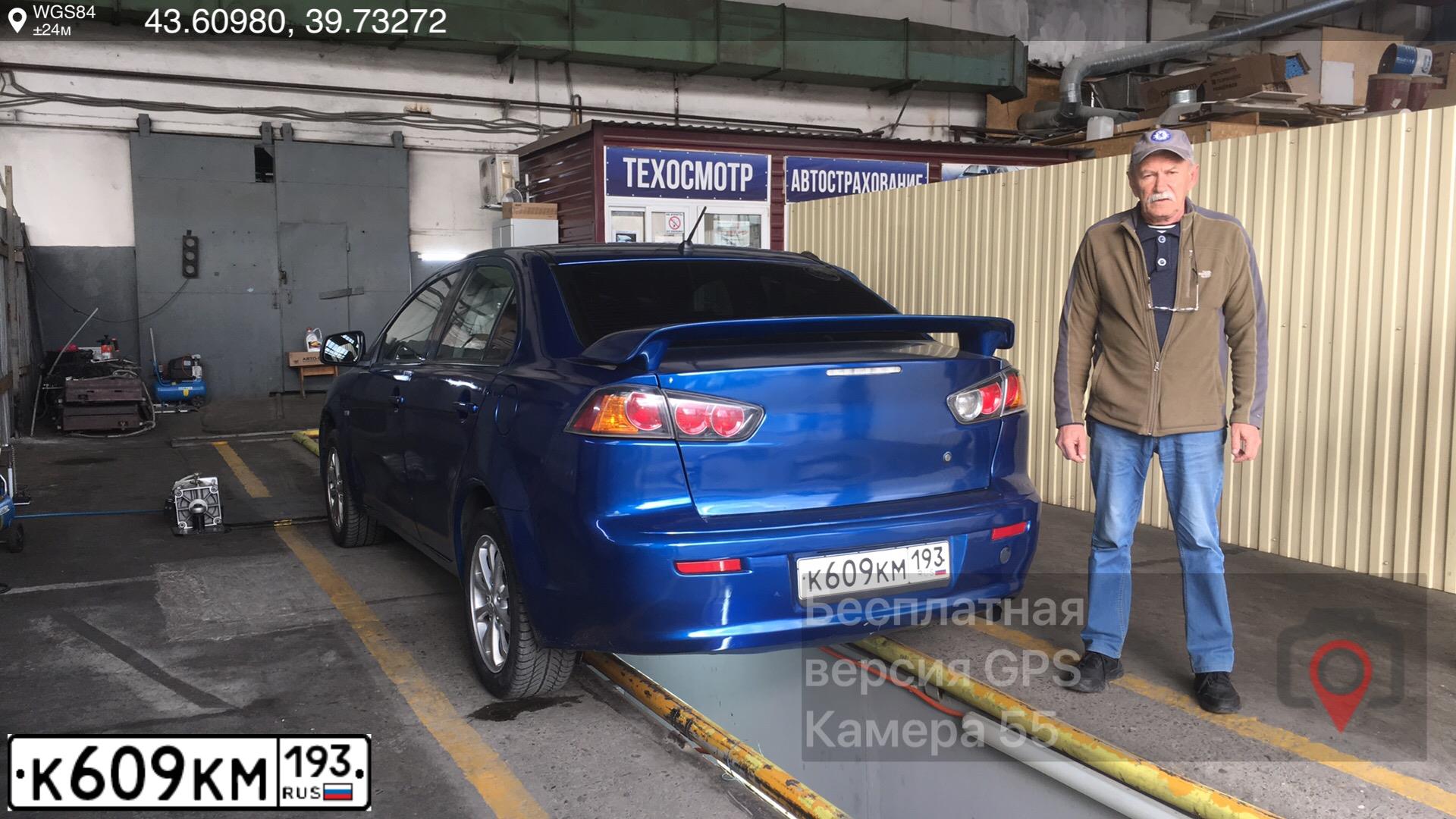Фото автомобиля MITSUBISHI LANCER, 2010 — госномер Т050ТУ123. Цвет: синий