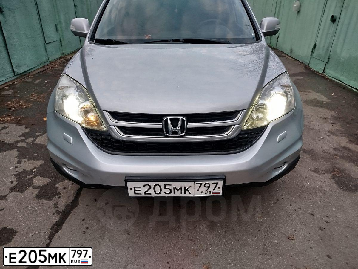 Фото автомобиля HONDA CR-V, 2011 — госномер Е205МК797. Цвет: СЕРЕБРИСТЫЙ