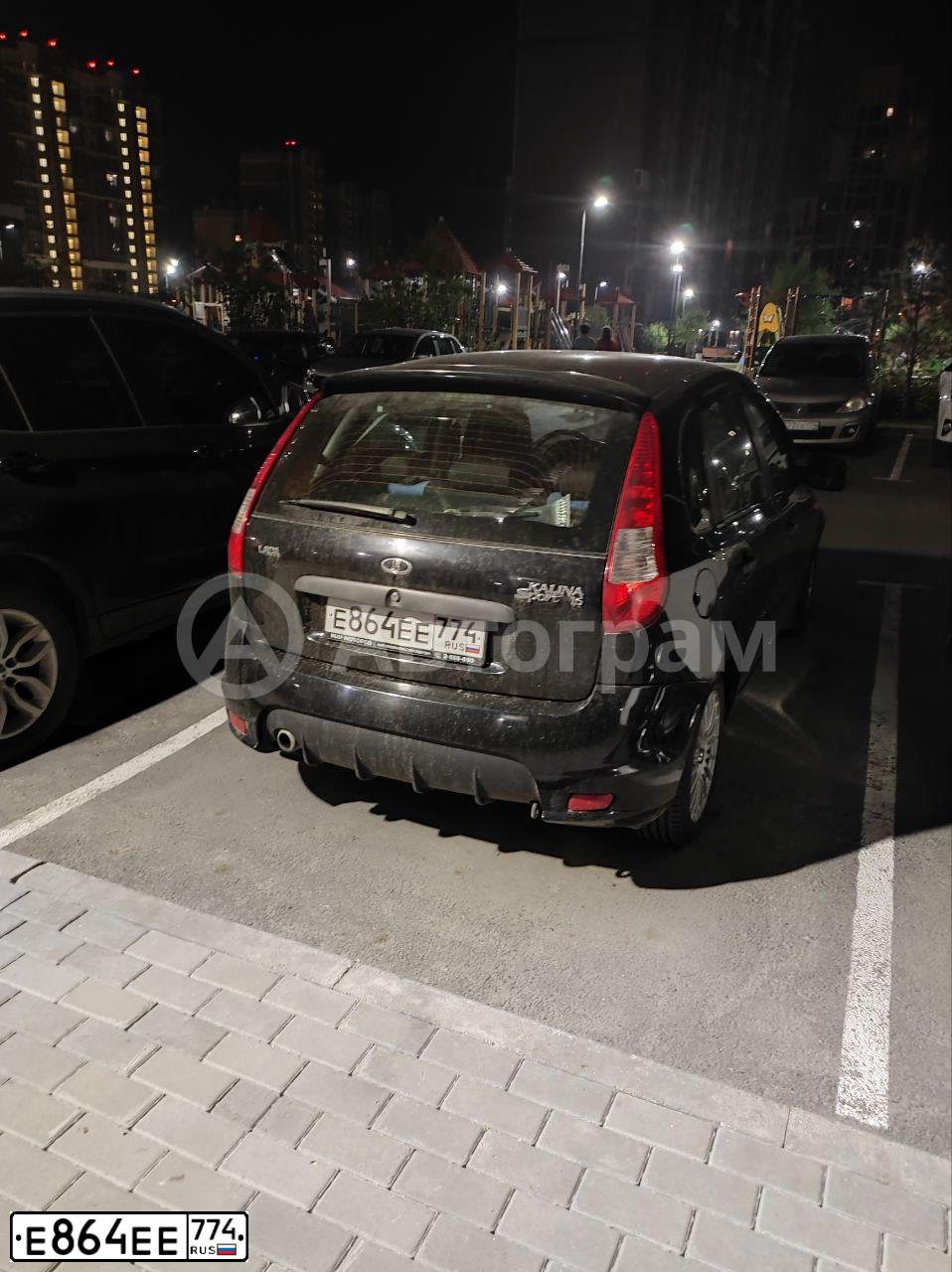 Фото автомобиля LADA 1119 KALINA, 2012 — госномер Е864ЕЕ774. Цвет: СИНЕ-ЧЕРНЫЙ