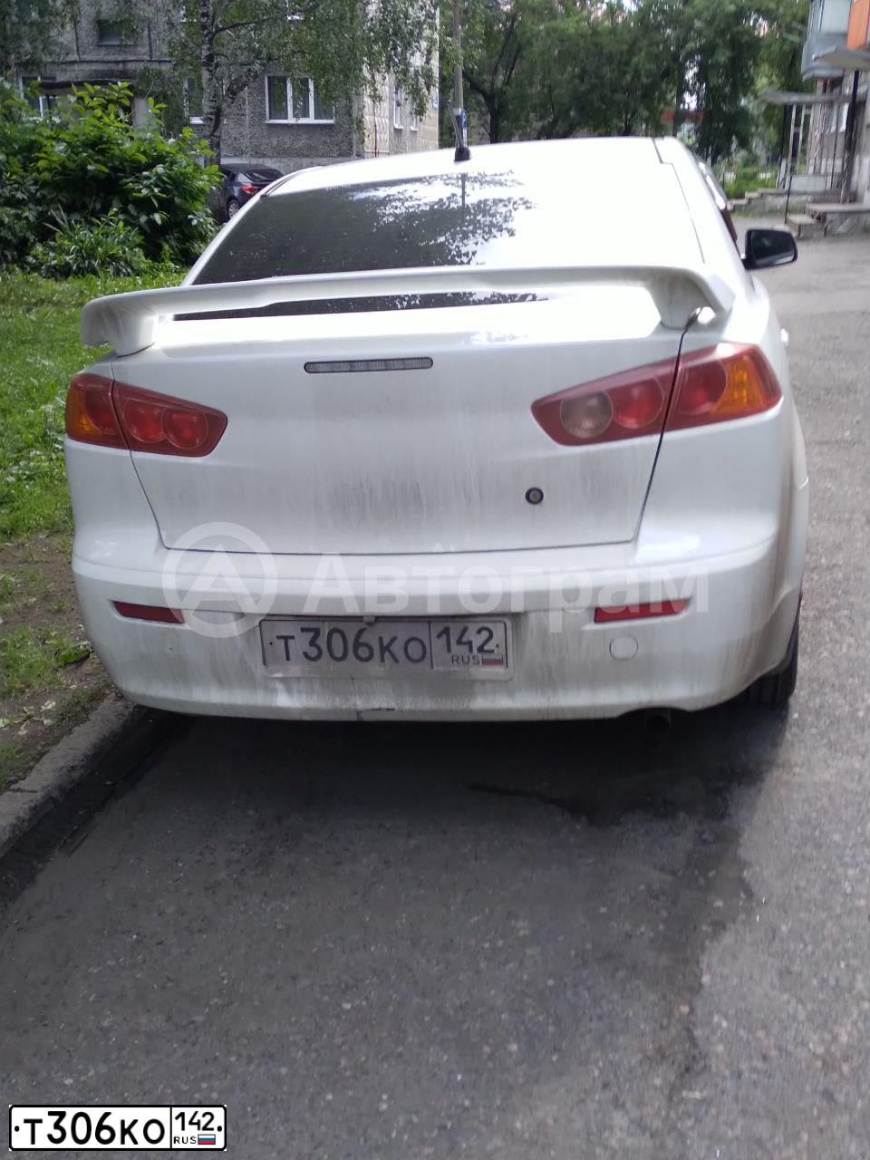 Фото автомобиля MITSUBISHI LANCER, 2008 — госномер Т306КО142. Цвет: БЕЛЫЙ