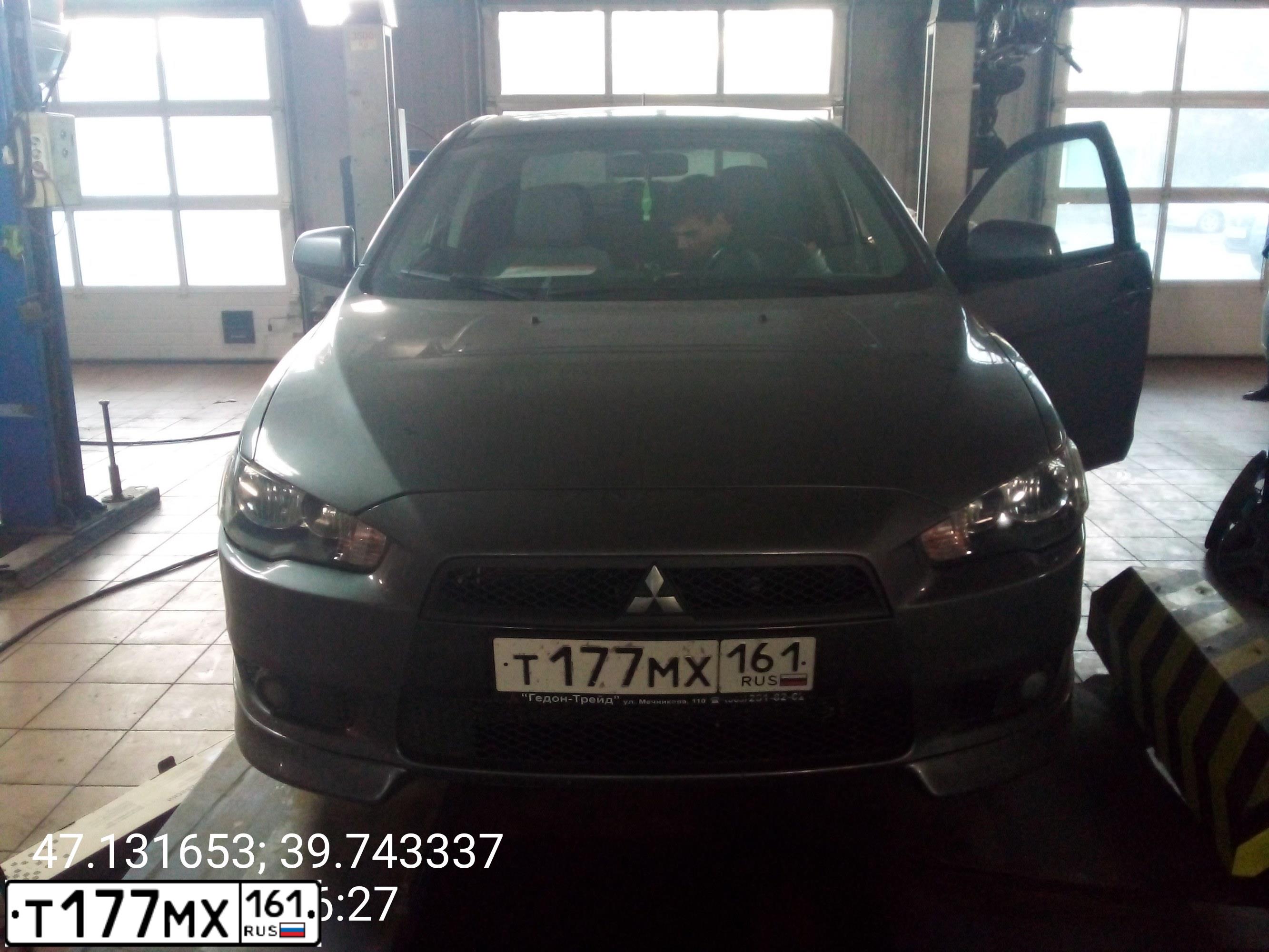 Фото автомобиля MITSUBISHI LANCER, 2010 — госномер Т177МХ161. Цвет: Серый