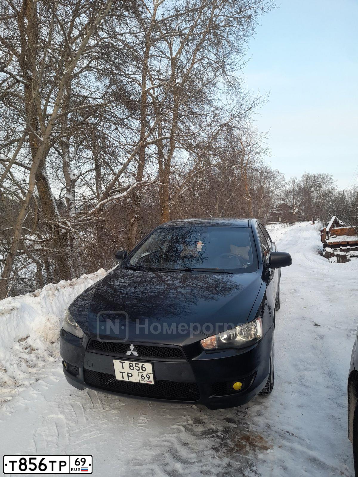 Фото автомобиля MITSUBISHI LANCER, 2008 — госномер Т856ТР69. Цвет: ЧЕРНЫЙ