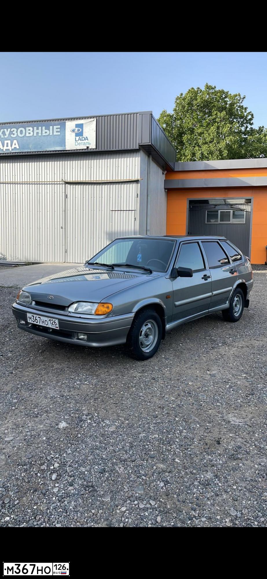 Фото автомобиля LADA 2114 SAMARA, 2011 — госномер В709СМ26. Цвет: СРЕДНИЙ СЕРО-ЗЕЛЕНЫЙ МЕТАЛЛ