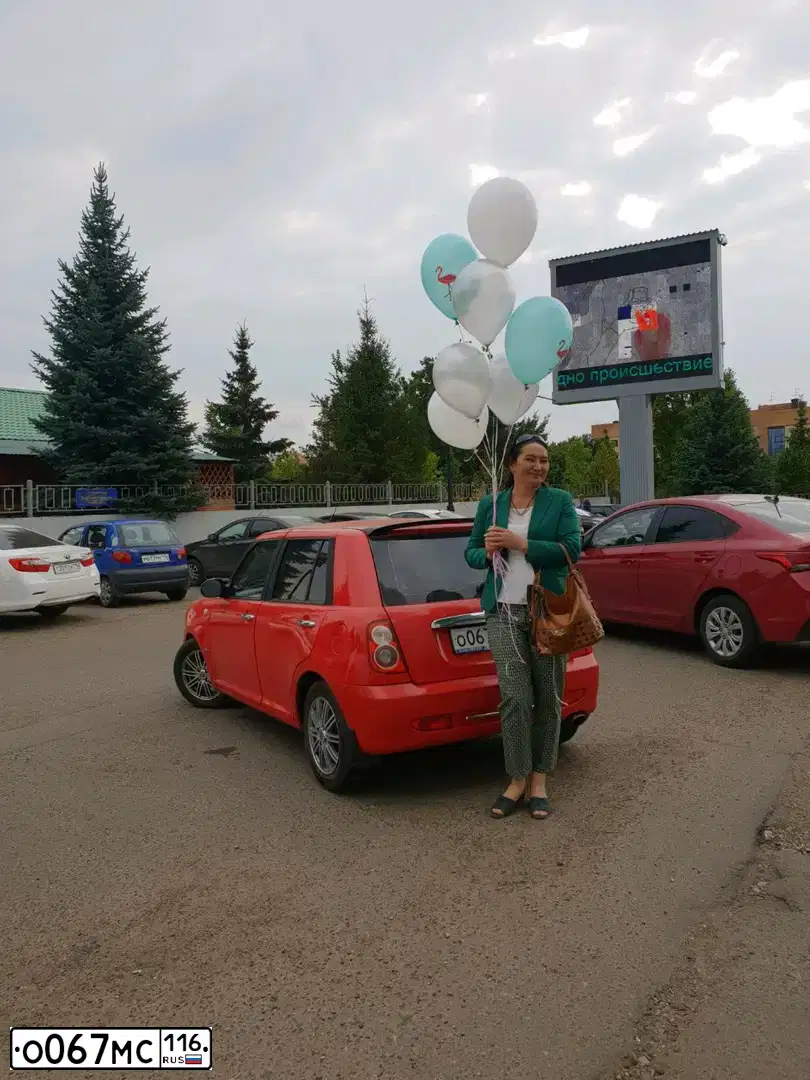 Фото автомобиля LIFAN SMILY, 2011 — госномер О067МС116. Цвет: Красный
