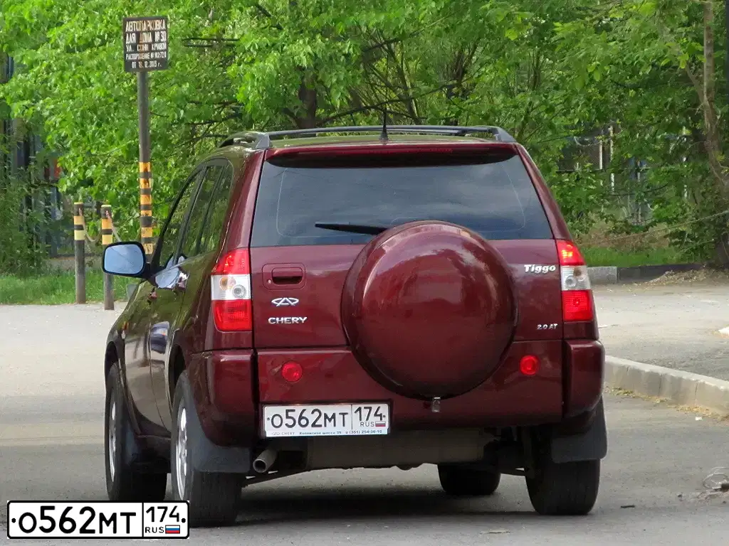 Фото автомобиля CHERY TIGGO, 2009 — госномер А605РТ186. Цвет: КРАСНЫЙ
