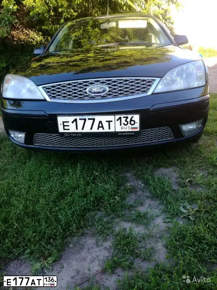 Фото автомобиля FORD MONDEO, 2005 — госномер О513АВ29. Цвет: ЧЕРНЫЙ
