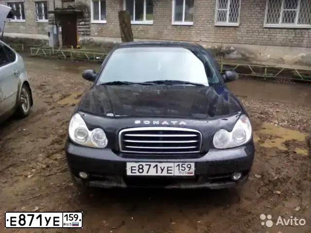 Фото автомобиля TAGAZ SONATA, 2006 — госномер Е871УЕ159. Цвет: ЧЕРНЫЙ