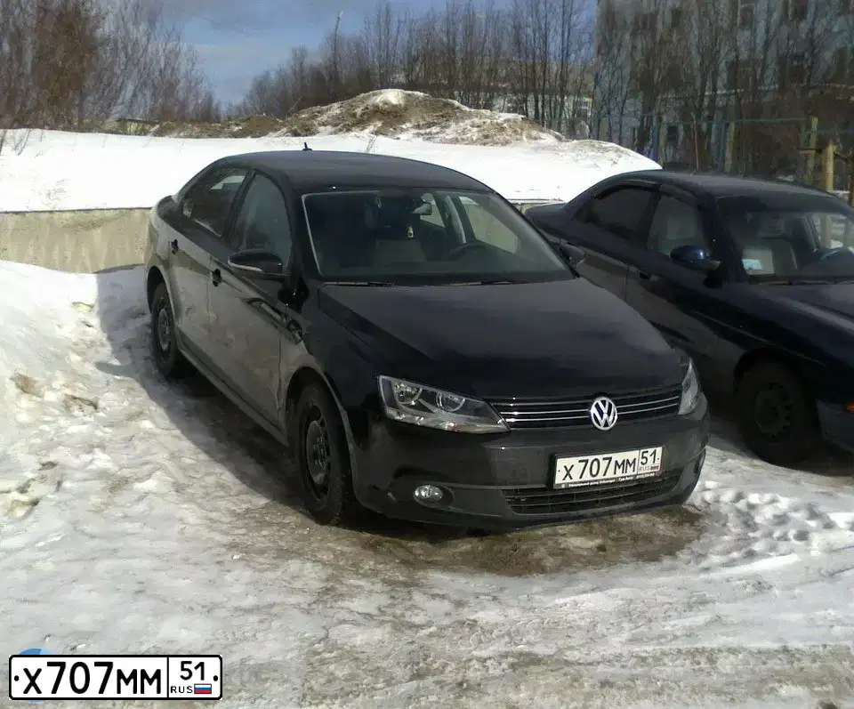 Фото автомобиля VOLKSWAGEN JETTA, 2011 — госномер Х707ММ51. Цвет: ЧЕРНЫЙ