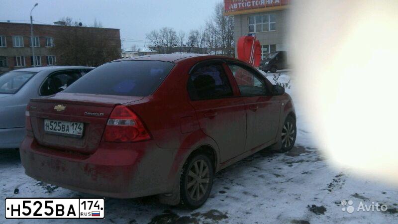 Фото автомобиля CHEVROLET AVEO, 2007 — госномер Р656СВ196. Цвет: Красный